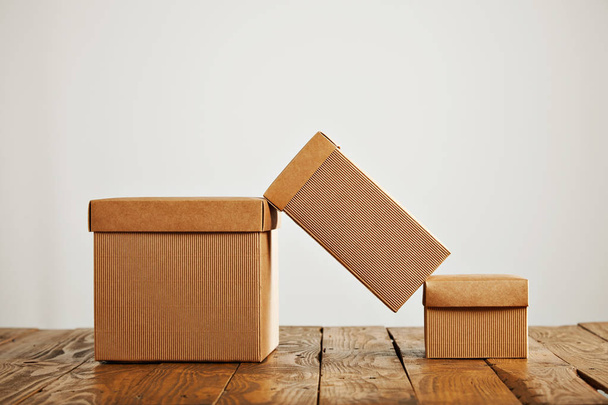Mockups of blank brown corrugated cardboard boxes - Fotoğraf, Görsel