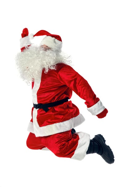 Радісний Санта-Клауса, стрибки і розмахуючи руками. - Фото, зображення