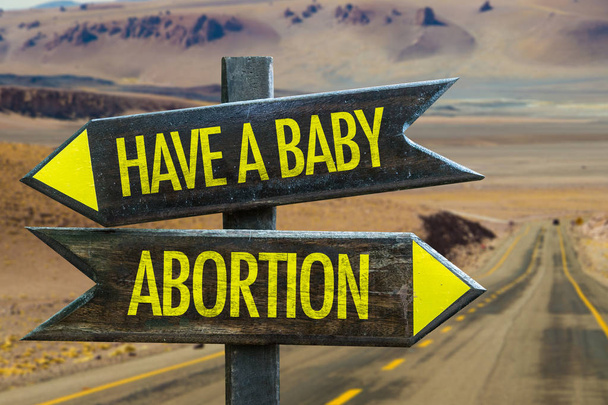 Baby vs abortus hebben - Foto, afbeelding