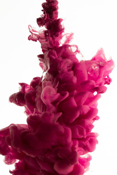 purple dye in water - Foto, afbeelding