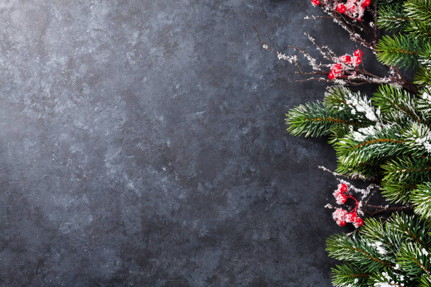Christmas background with snowy fir tree - Photo, Image