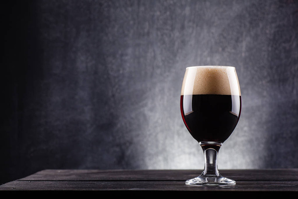 Glass of dark beer - Фото, зображення