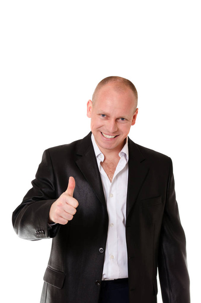 Adult male in a business suit smiling and showing a thumbs up on the isolated background - Foto, Bild