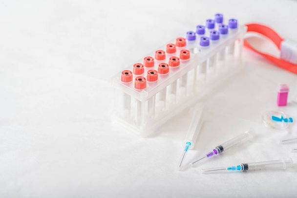 Medical flasks and needles for blood test - Фото, зображення