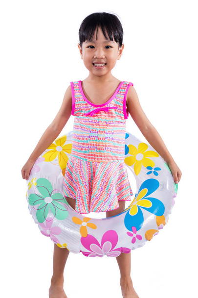 Asian Chinese little girl portrait wearing swimsuit with swim ri - Foto, Bild