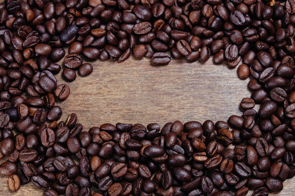 Coffee Bean on wood background with filter effect retro vintage  - Photo, Image