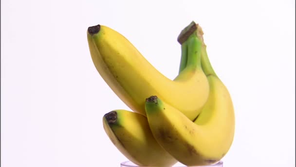 bananas rotating on white background - Footage, Video