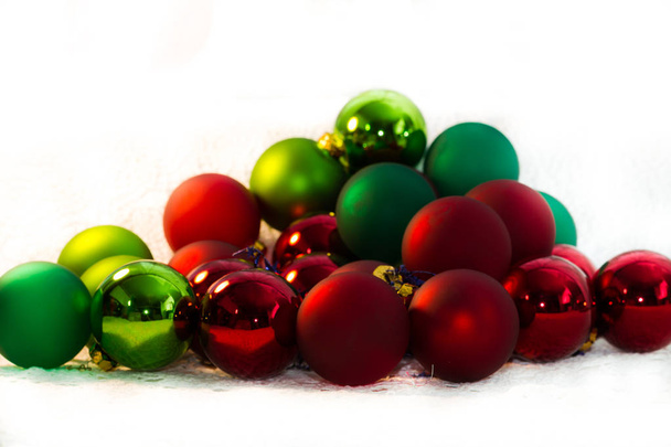 Christmas red and green balls, Christmas tree closeup - Фото, зображення