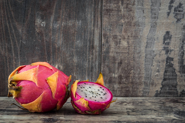 Dragon fruit on wooden table - Photo, Image