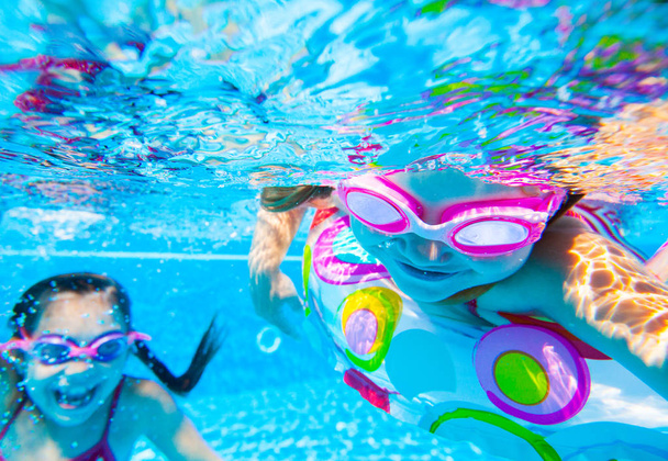 girls in swimming pool - Fotó, kép