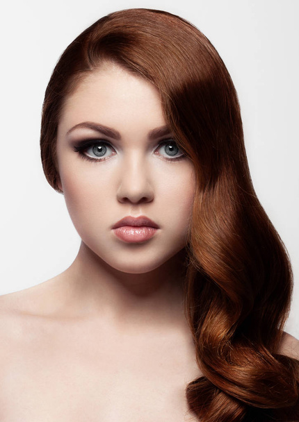 Ginger red long hair.Fashion girl portrait - 写真・画像