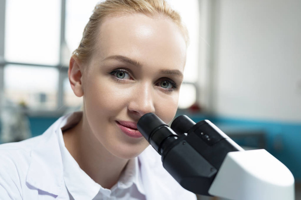Female researcher in a lab - Фото, изображение