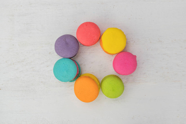 Colorful macaroon set on white wood background - 写真・画像