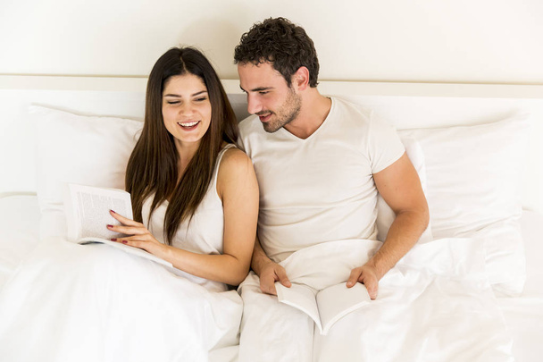 Young couple in the bed - Photo, image