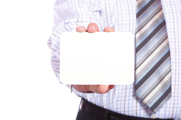 Business man handing a blank card isolated over white background - 写真・画像