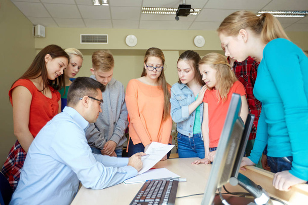 group of students and teacher with tests at school - Zdjęcie, obraz