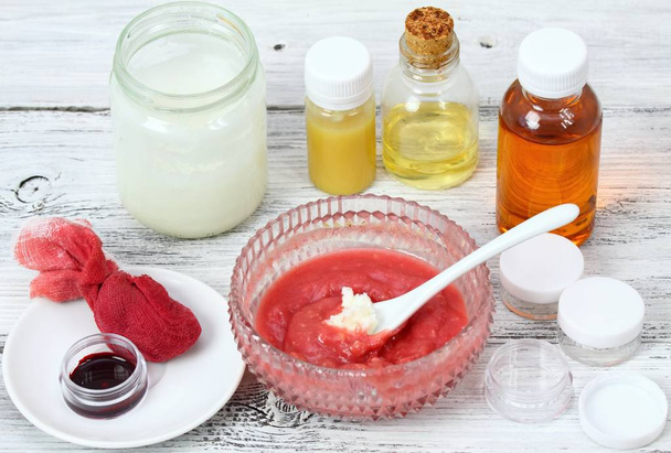 Making homemade lip gloss from various kinds of  oil and beeswax  - Photo, Image