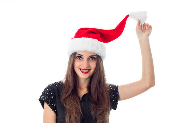 young brunette girl in santa hat - Foto, Imagem