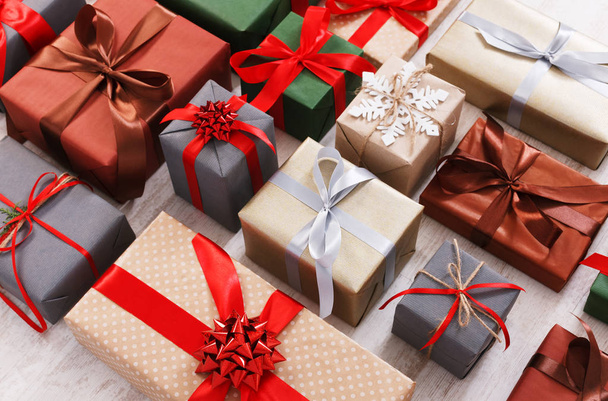 Lots of Gift boxes background, christmas presents in paper - Фото, изображение
