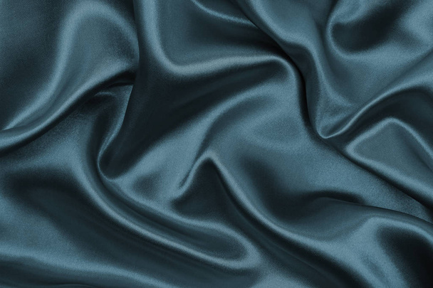Smooth elegant dark grey silk or satin texture as abstract backg - Фото, зображення