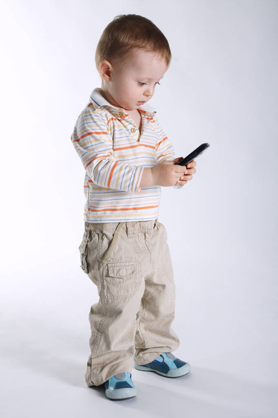 little boy with mobile phone - Foto, imagen