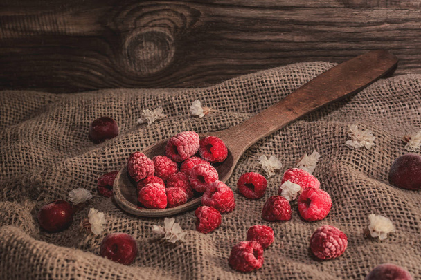  Raspberries in wooden spoon - Фото, зображення