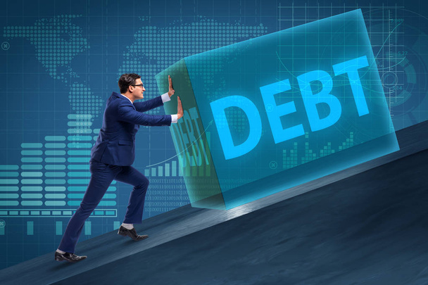 Uomo d'affari nel concetto di business del debito - Foto, immagini