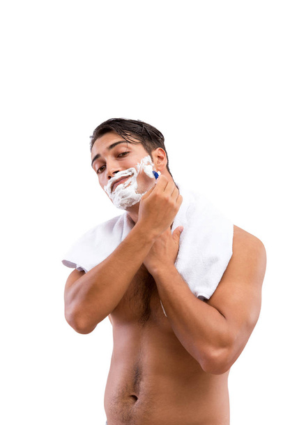 Handsome man shaving isolated on white background - 写真・画像
