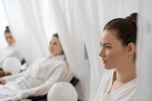 Image of young women relaxing in beauty salon - Фото, зображення