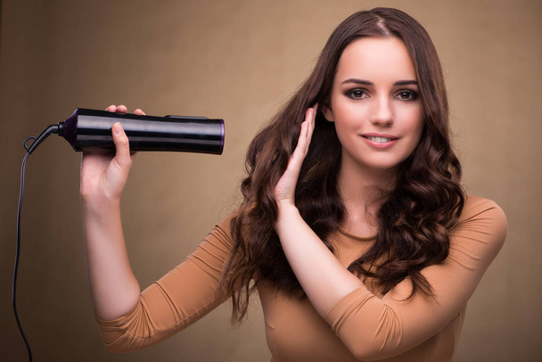 Beautiful woman with hair dryer - Photo, Image