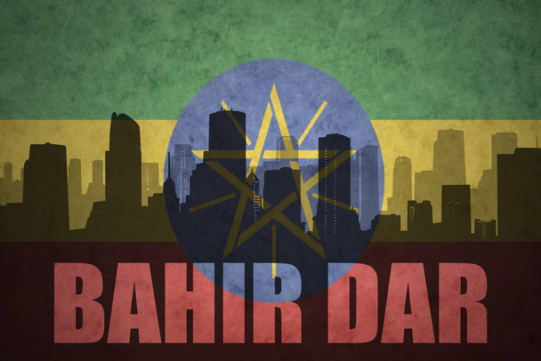 abstract silhouette of the city with text Bahir Dar at the vintage ethiopian flag - Photo, Image