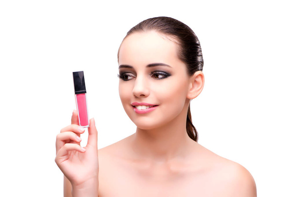 Vrouw met een lippenstift geïsoleerd op wit - Foto, afbeelding