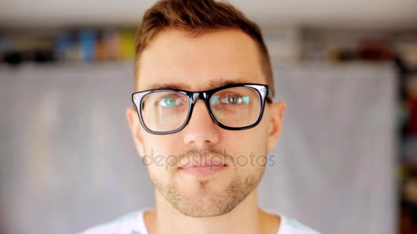 happy smiling man in eyeglasses - Filmati, video