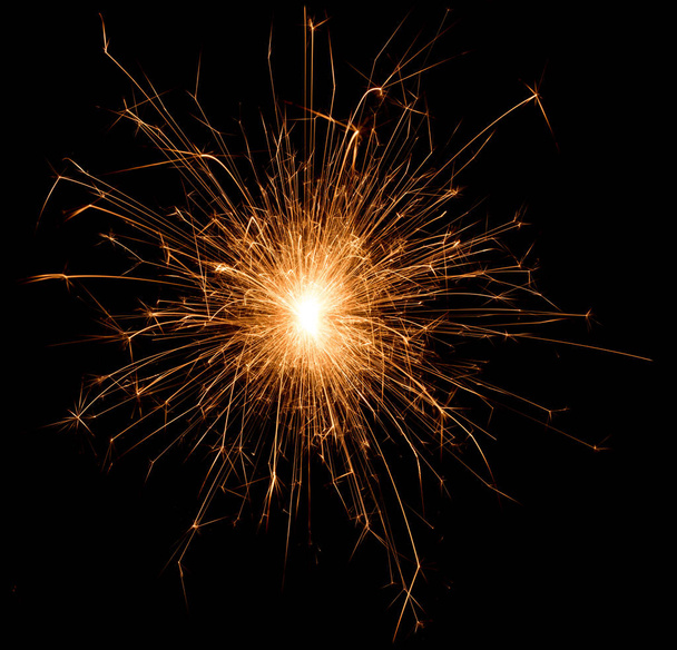 Christmas and new year party sparkler on black - Foto, Imagem