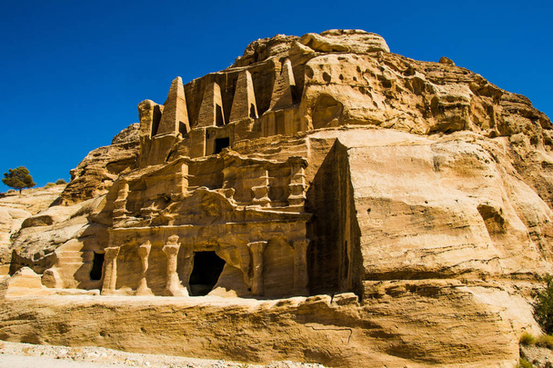 Obelisk Tomb and Bab As-Siq Triclinium ruins ancient Nabataean city Petra, Jordan near entrance to canyon Siq. Explore and adventure concept. - Photo, Image