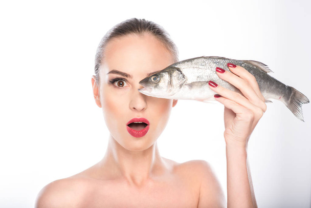 Cheerful woman is excited about seafood - Photo, image