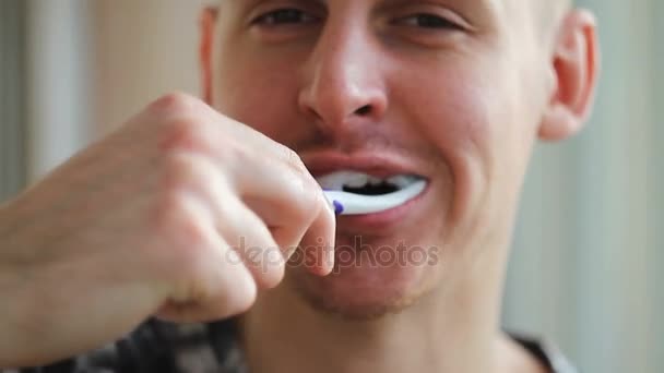 Man brushing his teeth in the morning - Footage, Video