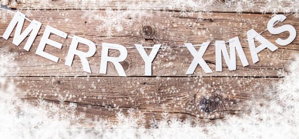 Χαρούμενα Χριστούγεννα σημάδι σε ξύλινα φόντο με αντίγραφο χώρου - Φωτογραφία, εικόνα