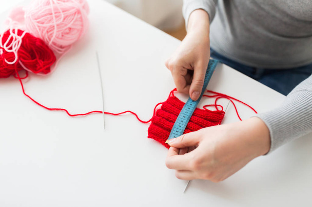 woman with knitting, needles and measuring tape - Φωτογραφία, εικόνα