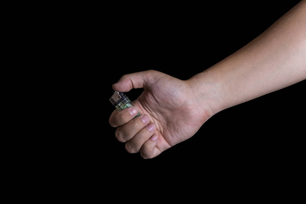 Hand and lighter on black - Fotó, kép