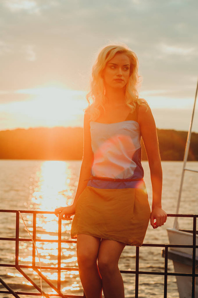 Beautiful blond at sunset - Foto, Bild