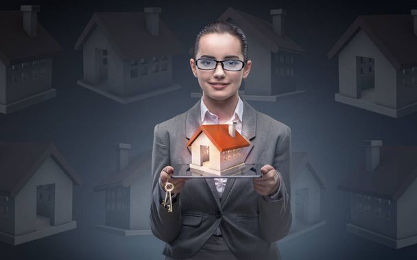 Businesswoman in housing mortgage concept - Photo, Image