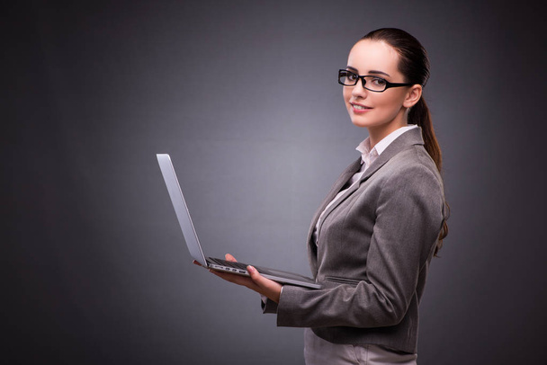 Businesswoman with laptop in business concept - Foto, Imagem