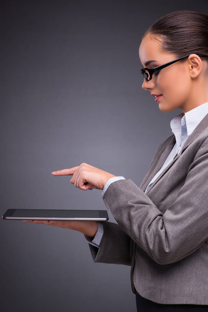 Woman with tablet computer in business concept - Photo, Image