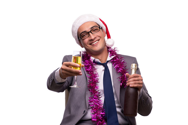 Молодой бизнесмен празднует Рождество в офисе
 - Фото, изображение