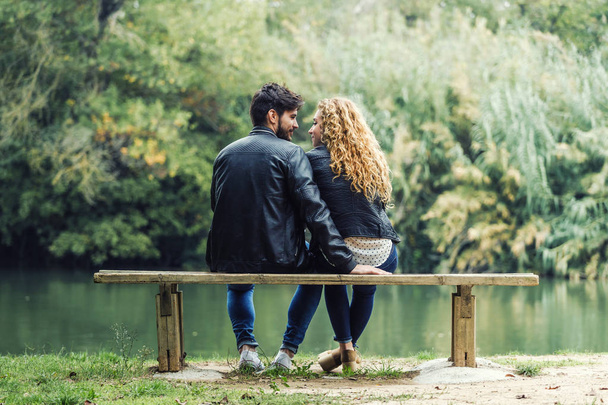 Beautiful young couple in love in the park. - 写真・画像