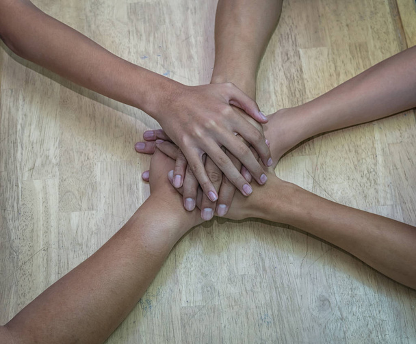 Hands Team togetherover the wooden - Photo, Image