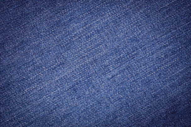 Texture of blue jeans background - Foto, afbeelding