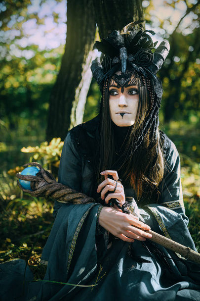 Woman-shaman with horns - Foto, Imagen