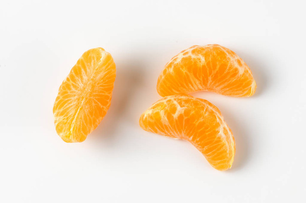 Segmentos pelados de mandarina
 - Foto, imagen